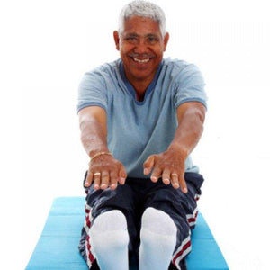 healthy older man touching toes