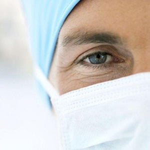 woman in surgical mask